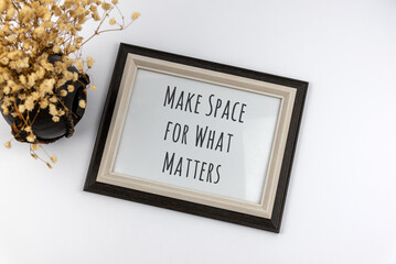Wall Mural - Inspirational quotes text in a frame - Make space for what matters