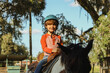 © Tamara Sales  - young boy with a horse riding and feeding and petting