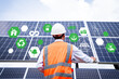 © Kampan - Businessman on a tour of solar power plants to check the operation of the power generation system. solar panels are an alternative electricity source to be sustainable resources in the future
