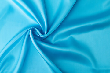 Close up of light blue silk background