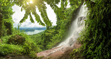 Aufkleber - Beautiful deep forest waterfall, Top landscape view looking to the lake, Kanchanaburi province, Thailand.