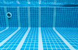 Fototapeta Paryż - The underwater image of the swimming pool at the resort