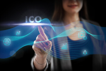 Business, Technology, Internet and network concept. Young businessman working on a virtual screen of the future and sees the inscription: ICO