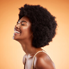 Wall Mural - Beauty, black woman and laughing wellness, skincare and natural makeup, aesthetic glowing skin and clean cosmetics on orange studio background. Smile, happy and young model face, afro hair and funny