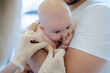 © zinkevych - Pediatric doctor performing a medical procedure on the newborn patient