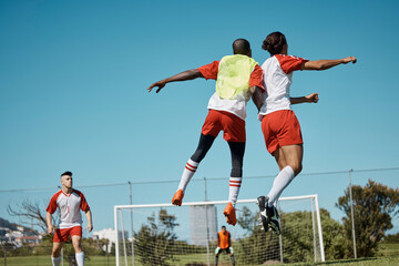 Wall Mural - Soccer players, jumping and soccer field team playing competitive sports with energy, passion and power. Fitness, sport and football players training on a field for speed, endurance and goal practice