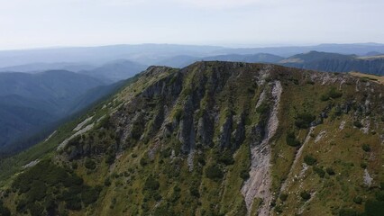 Sticker - Aerial scenic view of green nature, landscapes, mountains and trees on a sunny day