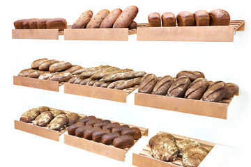 Wall Mural - Fresh bread on shelves in bakery isolated white