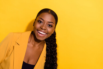 Wall Mural - Portrait of attractive cheerful wavy-haired girl expert copy empty blank space isolated on bright yellow color background