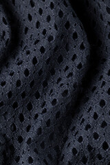 Wall Mural - Fashionable black cloth, ondulate modern textile close up view