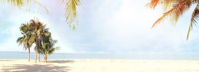 Sticker - blurred blue sky and leaves of coconut palm tree on white beach for panaroma tropical summer background