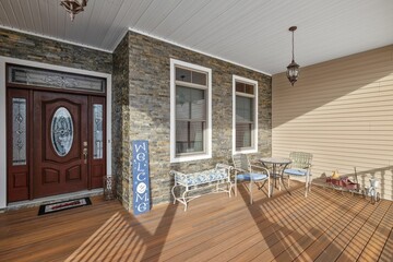 Sticker - Wooden deck with a brown entry door and other outdoor furniture pieces