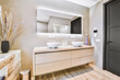 © ADDICTIVE STOCK - Interior of contemporary bathroom with white sink
