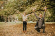 © BGStock72 - Grandfather spending time with his granddaughter in park on autumn day