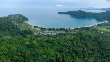 Aerial view of hills, tropical forest and Lhok paroy beach.	