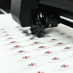 plotter cutting stickers typography polygraphy machine black labels contour cutting
