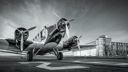 Wall Mural - historical aircraft on a runway