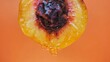 canvas print picture - cut peach with juice dripping on an orange background
