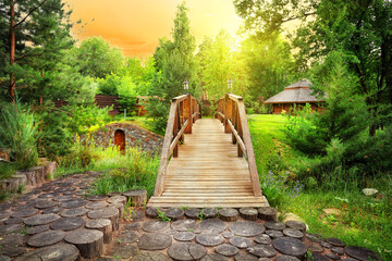 Wall Mural - wooden decorative bridge in the estate with landscaping