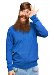 Poster - Young irish redhead man wearing casual clothes smiling positive doing ok sign with hand and fingers. successful expression.