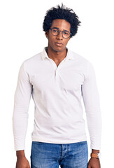 Sticker - Handsome african american man with afro hair wearing casual clothes and glasses depressed and worry for distress, crying angry and afraid. sad expression.