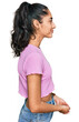 © Krakenimages.com - Hispanic teenager girl with dental braces wearing casual clothes looking to side, relax profile pose with natural face and confident smile.
