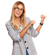 Beautiful blonde young woman wearing business clothes pointing to the back behind with hand and thumbs up, smiling confident