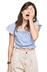 Canvas Print - Young beautiful caucasian girl wearing casual clothes yawning tired covering half face, eye and mouth with hand. face hurts in pain.