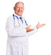 Senior handsome grey-haired man wearing doctor coat and stethoscope inviting to enter smiling natural with open hand