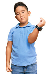 Canvas Print - Little boy hispanic kid wearing casual clothes doing italian gesture with hand and fingers confident expression