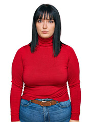 Poster - Young hispanic woman wearing casual clothes depressed and worry for distress, crying angry and afraid. sad expression.