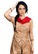 © Krakenimages.com - Young indian woman wearing traditional dress and glasses confuse and wonder about question. uncertain with doubt, thinking with hand on head. pensive concept.
