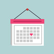 A flat style of calendar vector with a little heart on a blue background. Valentine's day.