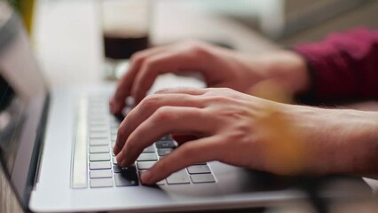 Wall Mural - close up of freelancer's developer hands typing program code on laptop keyboard in coworking. busine