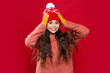 © be free - cheerful teen kid wear sweater and hat in studio. winter fashion for teen kid. hat knitwear.