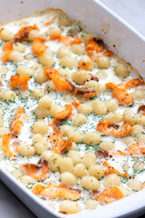 Wall Mural - potato gnocchi with salmon and dill sauce