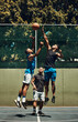 © Allistair F/peopleimages.com - Sports, start and men jump in basketball training match, cardio exercise and fitness workout on a basketball court. Challenge, healthy and young African players jumping high in game action for a tip