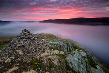 Summit Cairn On Yew Crag Above Misty Ullswater At Sunrise, Gowbarrow Fell, Lake District National Park, UNESCO World Heritage Site, Cumbria, England, United Kingdom