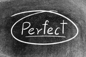 Poster - White chalk hand writing in word perfect and circle shape on blackboard background