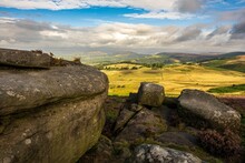 Higger Tor Mountain Peak In The Peak District National Park, UK Under A Cloudy Sky