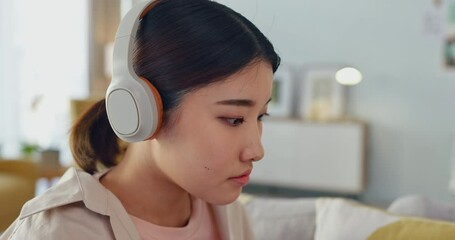 Canvas Print - Asian girl, student and studying with laptop, college and online research, technology and education, headphones for music and study for learning. Gen Z, youth and typing notes, search the internet.