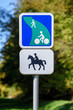 Shared-use path sign (reserved for walkers, bikers and riders) posted on a French Greenway, set aside for recreational use or environmental protection.