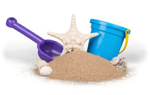 Toy Bucket And Shovel With Sand And Seashells