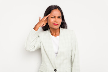 Wall Mural - Young business Indian woman isolated on white background showing a disappointment gesture with forefinger.