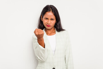 Wall Mural - Young business Indian woman isolated on white background showing fist to camera, aggressive facial expression.