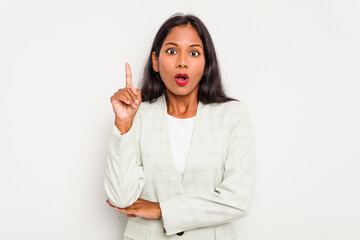 Wall Mural - Young business Indian woman isolated on white background having some great idea, concept of creativity.