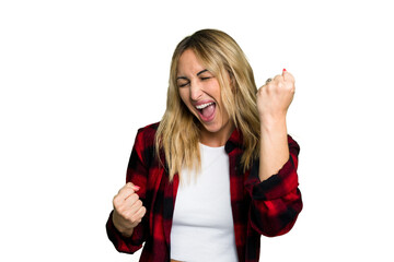 Wall Mural - Young caucasian woman isolated on green chroma background cheering carefree and excited. Victory concept.