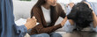 © Pormezz - couple relationship therapy with a counselor. Close Up hands of the woman client during a conversation with psychologist to find problems and solution.