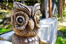 A Picture Of A Wooden Sculpture Of An Owl Totem