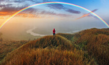 Woman Looking At Rainbow. Rainbow Over The River. Nature Of Ukraine